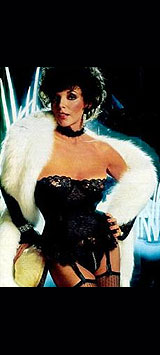 Joan Collins en corset